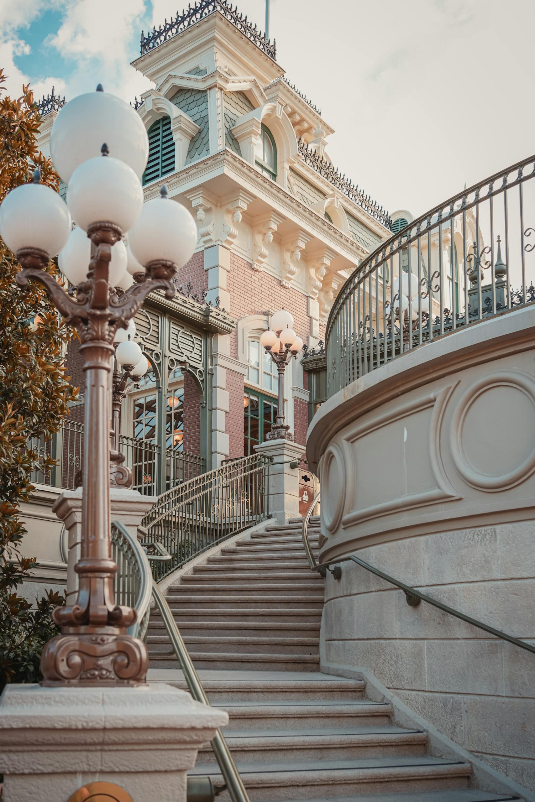 Ornate grand stairway leading up to a theme park entrance in Orlando, Florida.